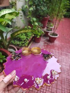 Handcrafted 8-inch deep purple resin Rakhi thali with latticed golden katoris and pearl accents