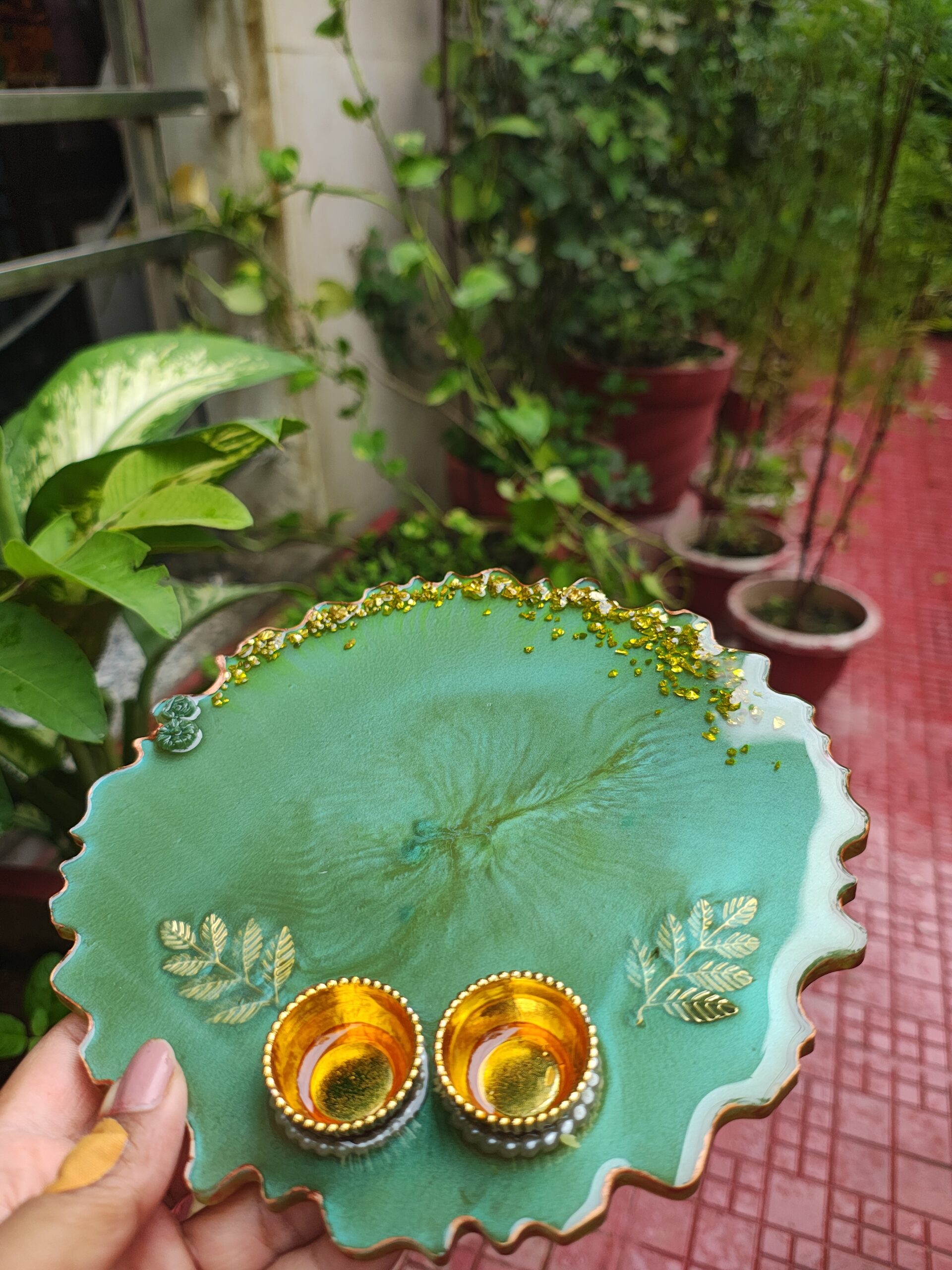 Handcrafted 8-inch emerald green resin Rakhi thali with top gold flakes and bottom golden katoris