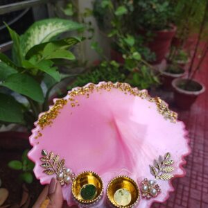Handcrafted 8-inch bright pink resin Rakhi thali with golden katoris and gold leaf flakes