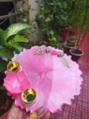 Handcrafted 8-inch baby pink resin Rakhi thali with 3D pink flower accent and golden katoris