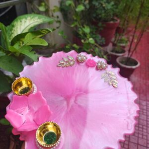 Handcrafted 8-inch baby pink resin Rakhi thali with 3D pink flower accent and golden katoris