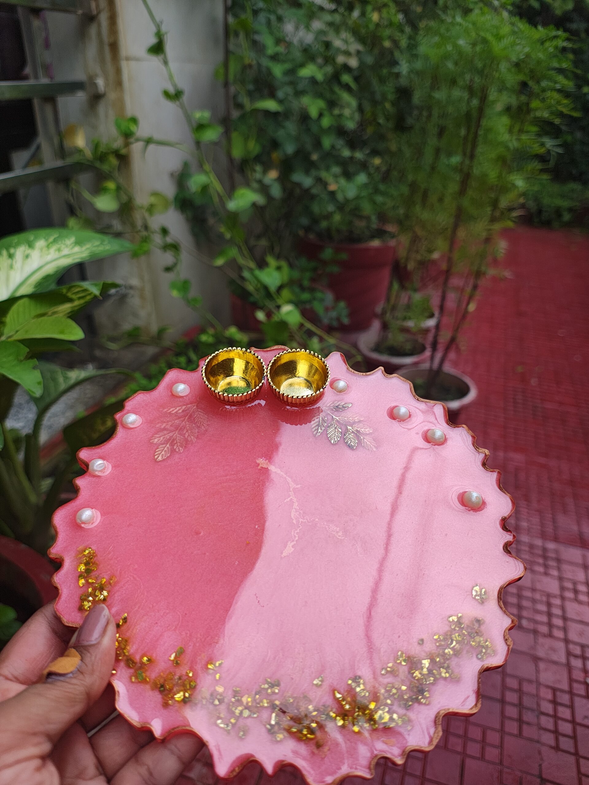 Handcrafted 8-inch coral pink resin Rakhi thali with pearl border and golden katoris