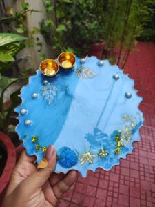 Handcrafted 8-inch ocean blue resin Rakhi thali with gold leaf flakes and golden katoris
